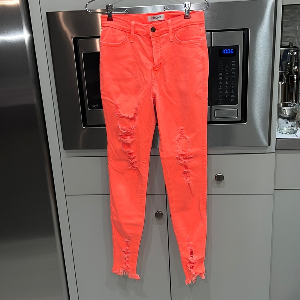 Neon orange skinny jeans